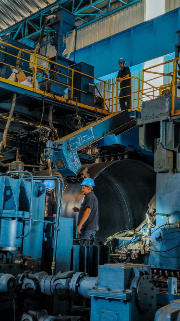 Steel mill worker with draw wire encoder roll gap measurement
